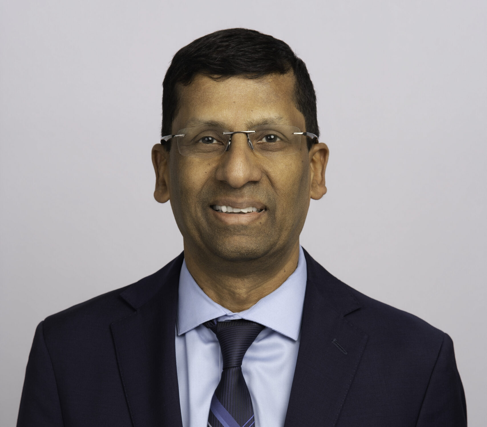 Headshot of Dr. Raghu Adiga